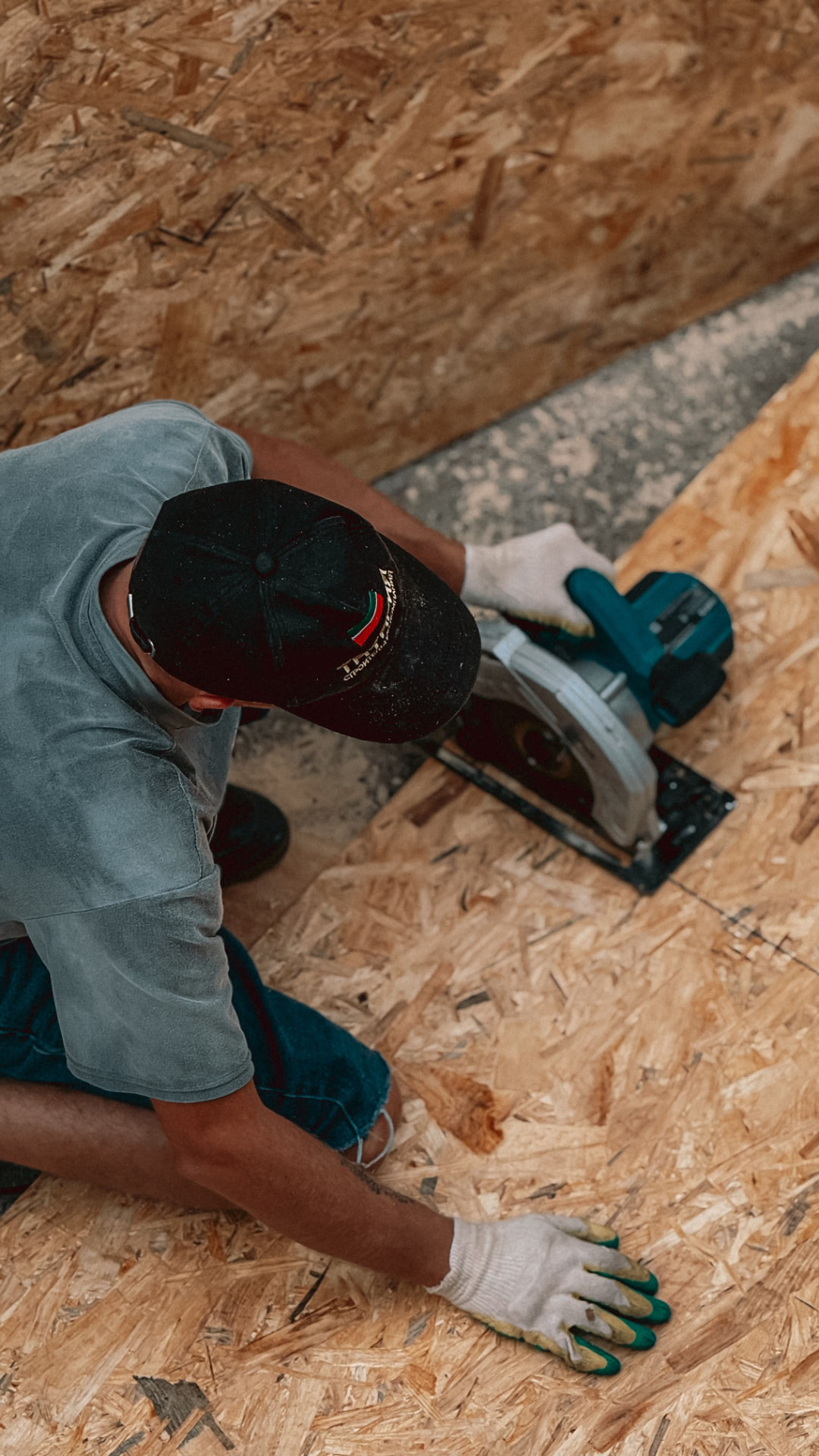Carpenter using a circular saw during hands-on construction work