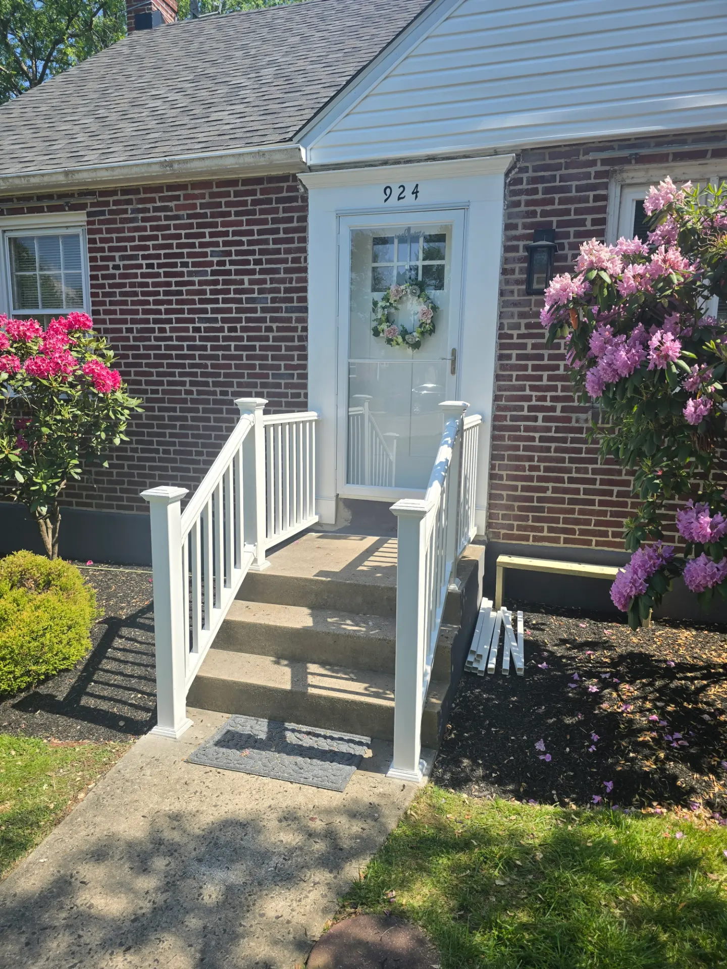 Completed front entry railing at a Delaware County home